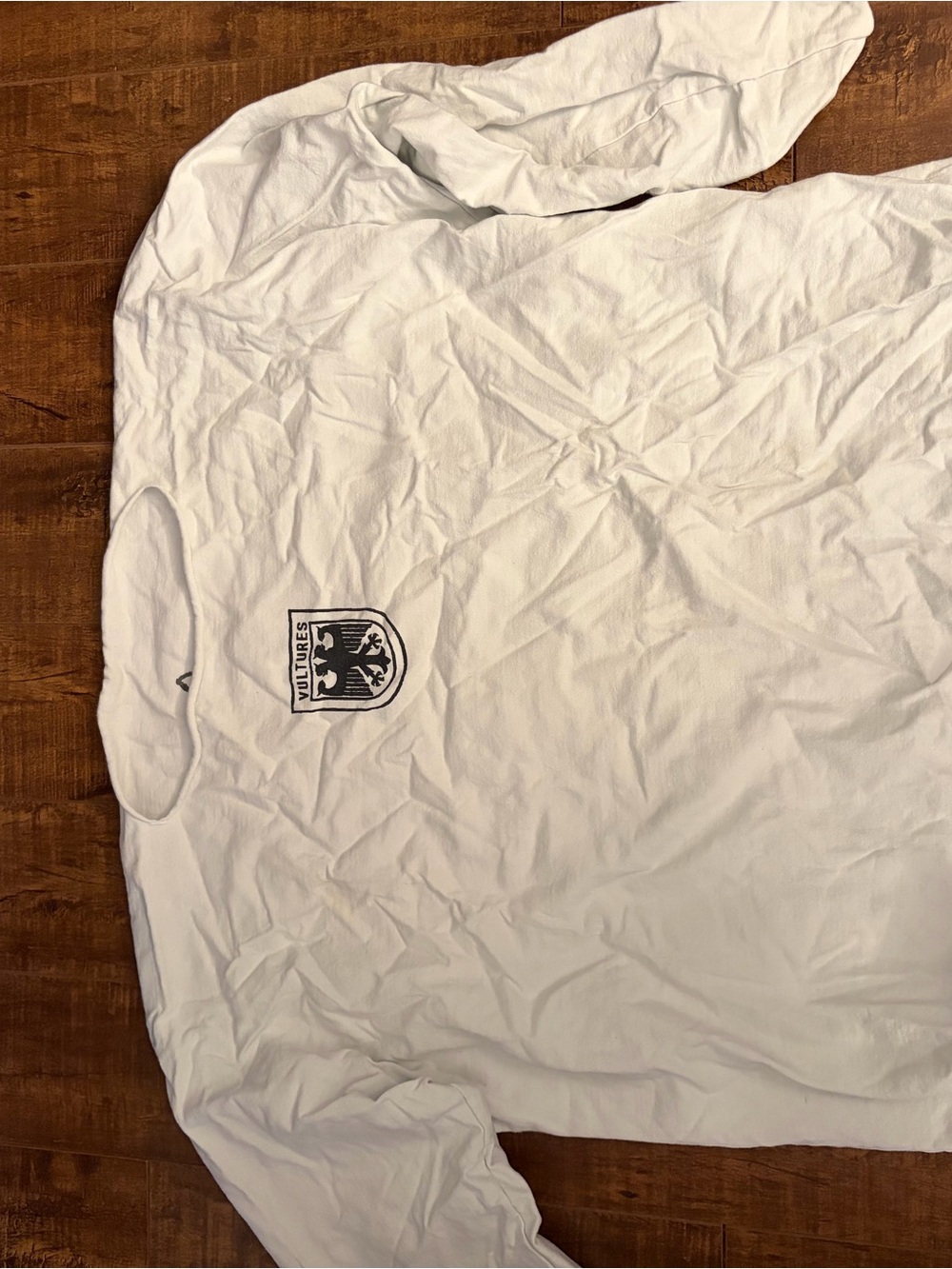 Yeezy White Long-Sleeve Tee with Black Chest Emblem